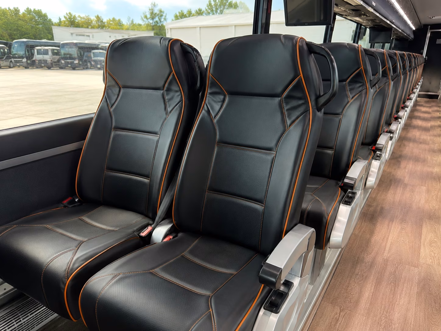 compare sporting event transportation options in lawrence and beyond