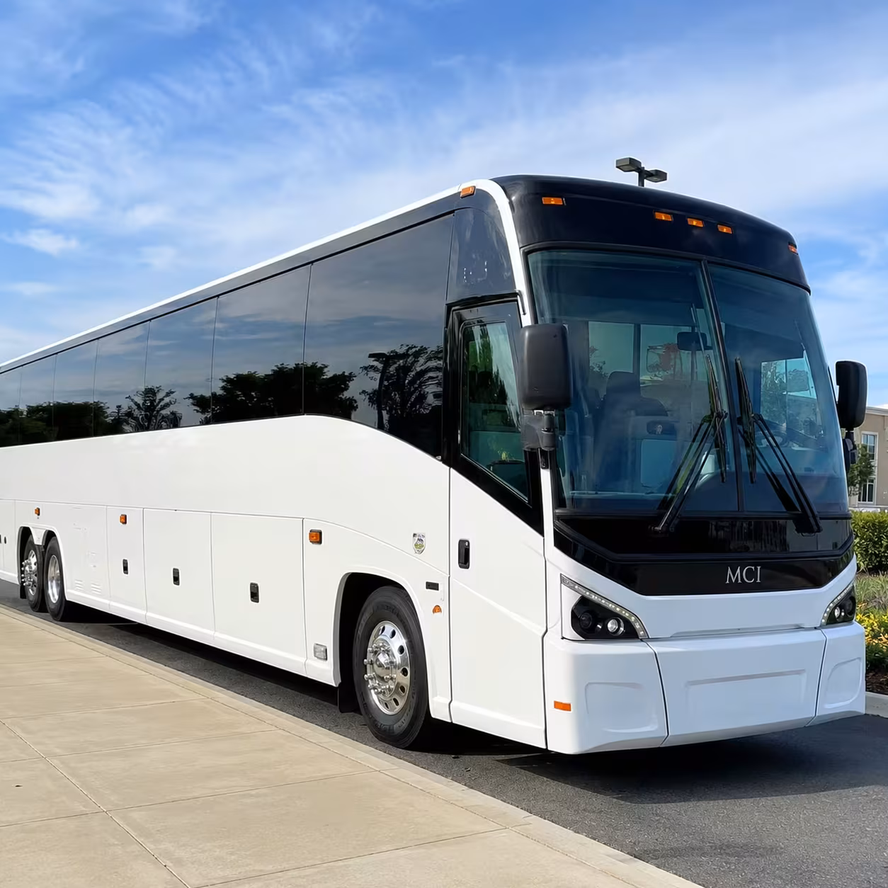 how trip distance and duration affect charter bus rates in lawrence